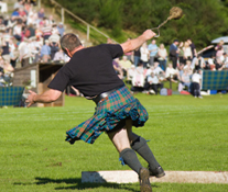 Man Throwing Weight at Highland Games